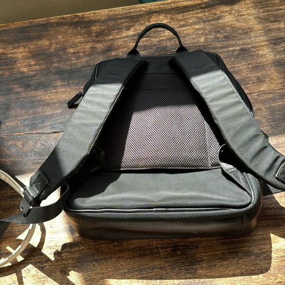 The Toppu black backpack minimalist sleek design unisex